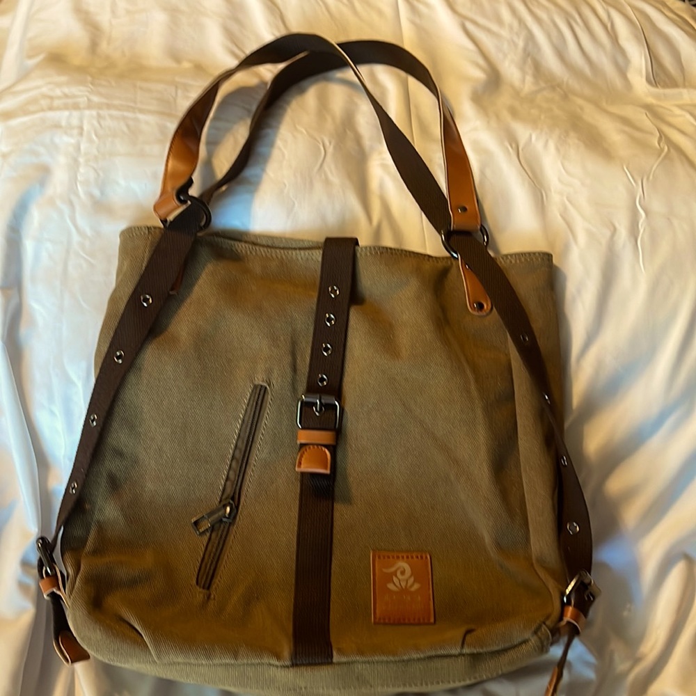 A beautiful brown and interior Grey satchel:‎ brand-new never used!